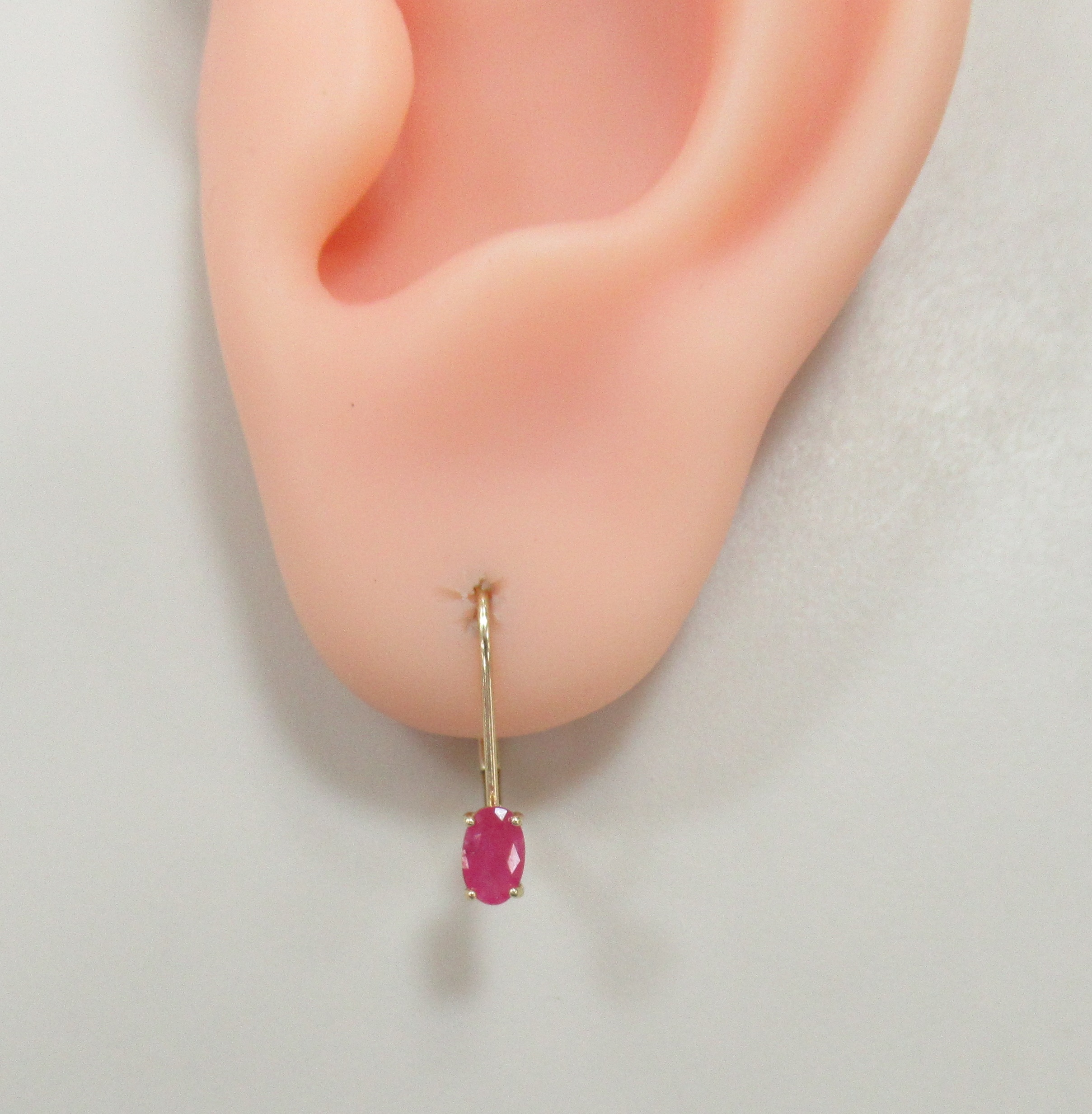 Серьги из желтого золота с рубинами